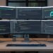 Developer working with AI DevOps agent interface inside GitHub platform on multiple monitors.
