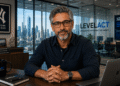 Stan discussing AI-driven DevOps inside a modern enterprise office