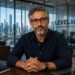 Stan discussing AI-driven DevOps inside a modern enterprise office